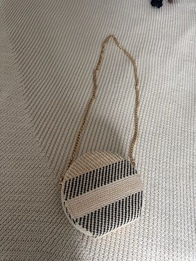 Woven Round Crossbody Bag in Natural and Black with Gold Chain